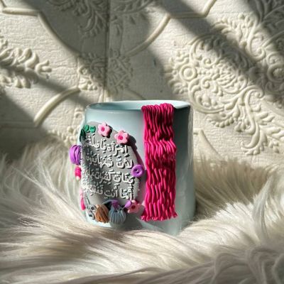 كوب مكتوب عليه الإنجيل