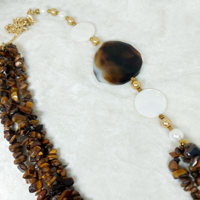 "A necklace made of tiger stones.