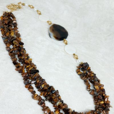 "A necklace made of tiger stones.