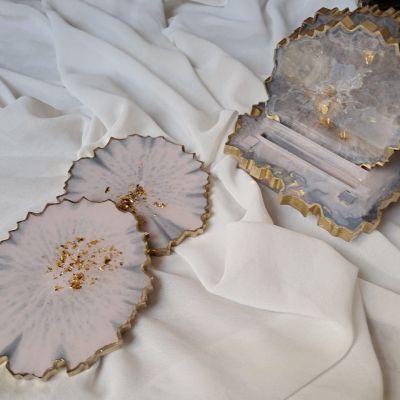 طقم كوسترات ريزن بالحامل بتاعها