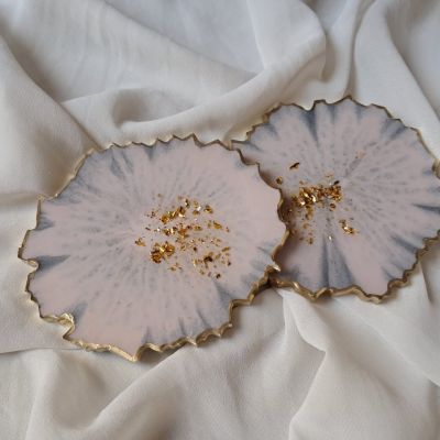 طقم كوسترات ريزن بالحامل بتاعها