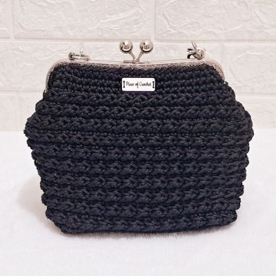 Crochet evening bag with metal frame