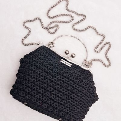 Crochet evening bag with metal frame