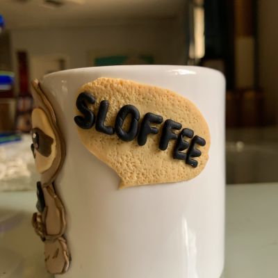 مج صلصال حراري sloth coffe 
