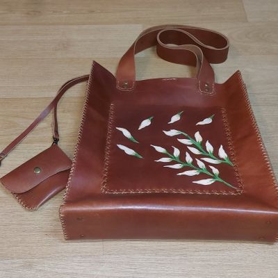 "Handmade natural leather bag."