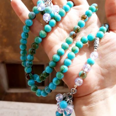 Rosary of 99 turquoise beads in hazel