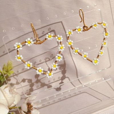 حلق نحاس علي شكل قلب