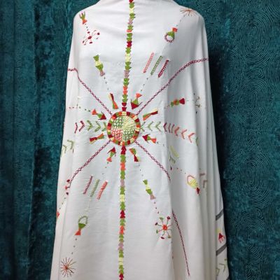Hand embroidered cotton shawl by talanted Siwa oasis women.