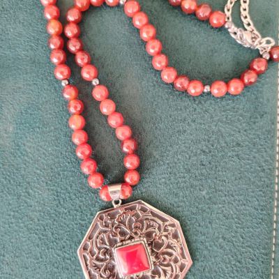 Red agate necklace with plated copper pendant
