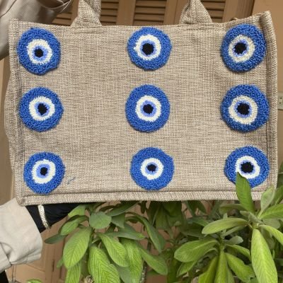 شنطه العيون الزرقاء من الخيش المستورد 