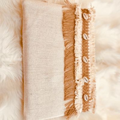 Linen clutch decorated with shells