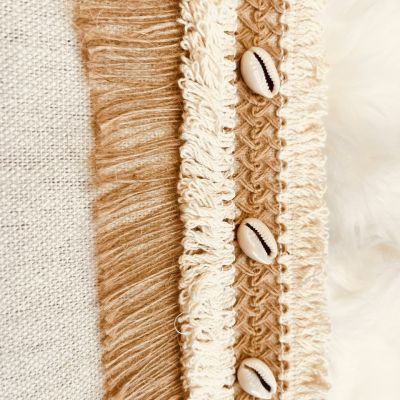 Linen clutch decorated with shells