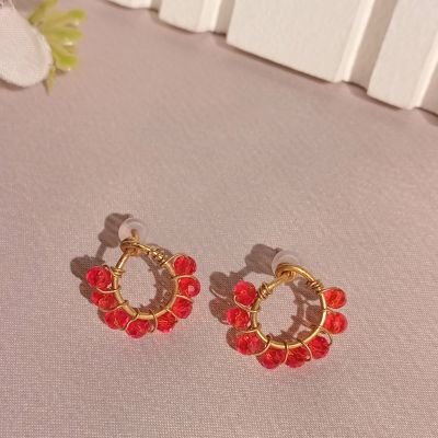Copper earring with red crystal beads