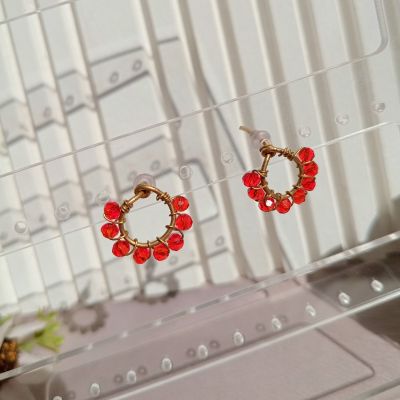 Copper earring with red crystal beads