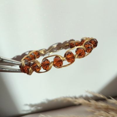 أسورة نحاس بخرز كريستال بني