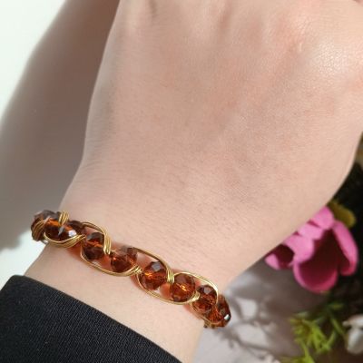 أسورة نحاس بخرز كريستال بني