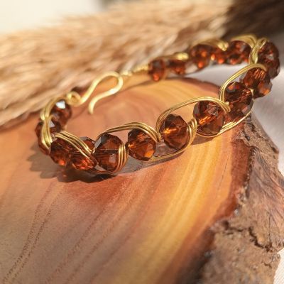 أسورة نحاس بخرز كريستال بني