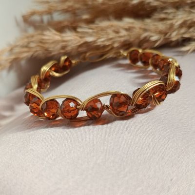 أسورة نحاس بخرز كريستال بني