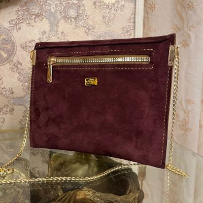 كلاتش من الجلد الطبيعي 