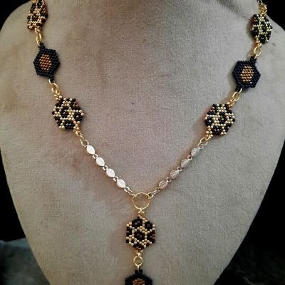 مجموعة بتصميم جلد النمر الذهبى  من خرز الميوكى