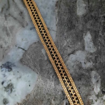 مجموعة رقيقة من الذهبى والأسود ( إسورة وخاتم ) من خرز الميوكى