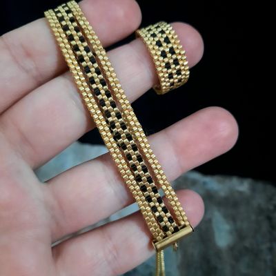 مجموعة رقيقة من الذهبى والأسود من خرز الميوكى