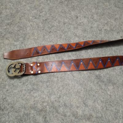 حزام جلد طبيعي برسمه مثلثات