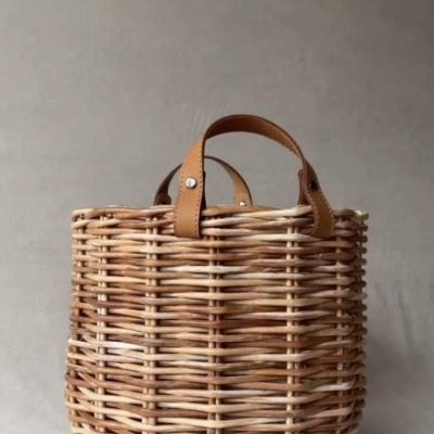 Handmade basket with leather hands