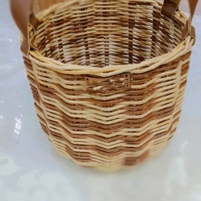 Handmade basket with leather hands