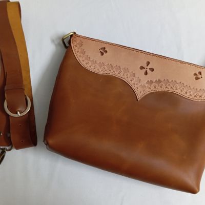 Genuine leather bag, hand engraved and hammered