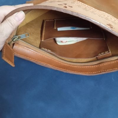 Genuine leather bag, hand engraved and hammered