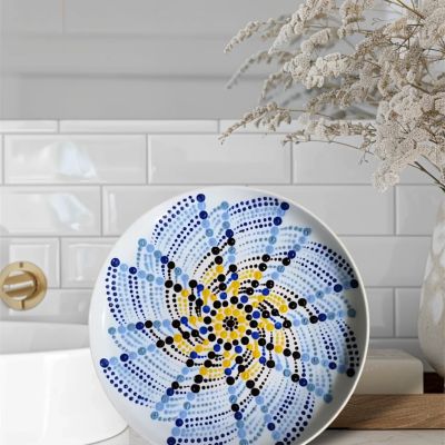 Dotted art on porcelain plate 1