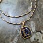 A necklace with a letter design by Miyuki beads