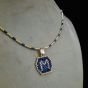 A necklace with a letter design by Miyuki beads