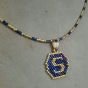 A necklace with a letter design by Miyuki beads