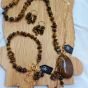A set consisting of a necklace, bracelet, and earrings made of Tiger's Eye stones.