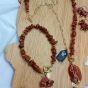 A set including a necklace, earrings, and a bracelet, made from broken agate stones