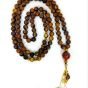 A 99-bead prayer necklace made from tiger eye stones.