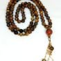 A 99-bead prayer necklace made from tiger eye stones.