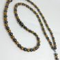 A 99-bead prayer necklace made from hematite stones.