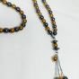 A 99-bead prayer necklace made from hematite stones.