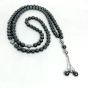 A 99-bead prayer necklace made from hematite stones.