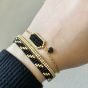 طقم أساور أسود و ذهبي 