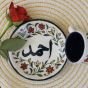 coffee cup and plate decorated with name 