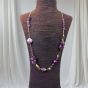 The necklace is made of amethyst stones.