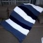  Blue handknitted blanket 
