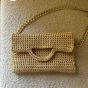 Golden clutch bag