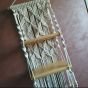 A macrame shelf 