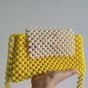 Beaded bags in yellow color