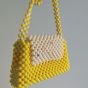 Beaded bags in yellow color